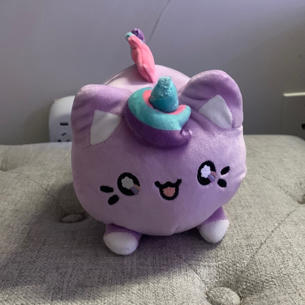 Purple unicorn cat stuffed animal
